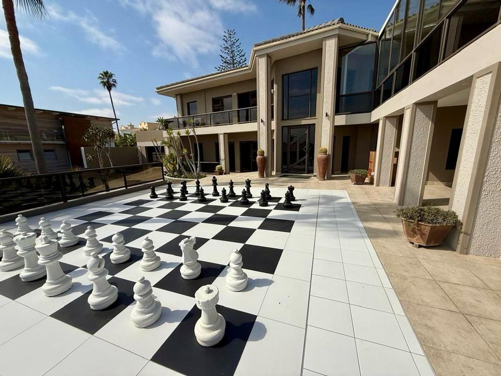 Large patio with man-sized chessboard