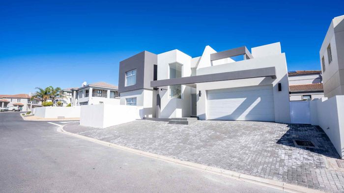 For Sale: House in Langebaan Country Estate with dual braai areas and garage.