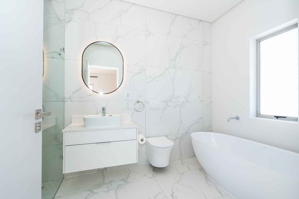 Main bathroom with bath and luxury shower 