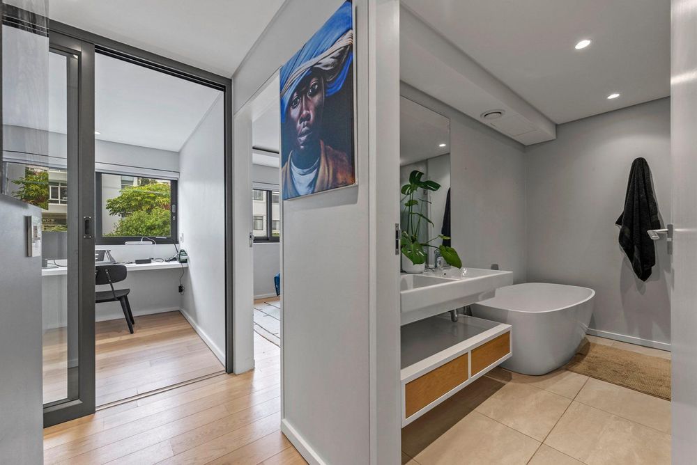 guest bathroom with bath and shower