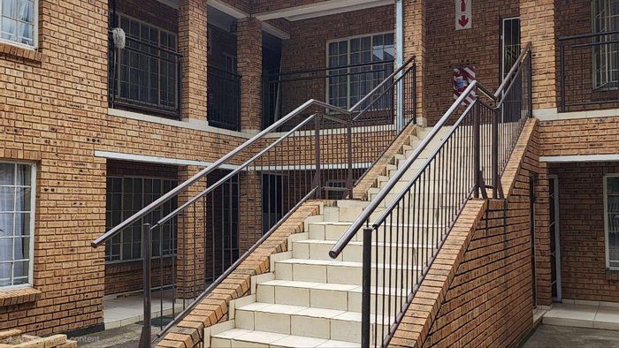 For Sale: Apartment in Rustenburg Central with 2 bedrooms, open-plan living, near amenities.