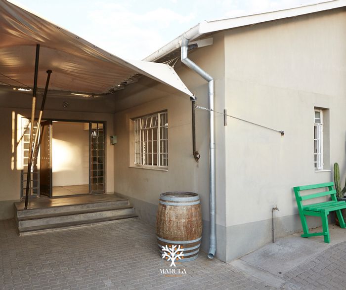 To Rent: Office in Windhoek Central with multiple rooms, parking, and kitchenette.
