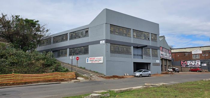 Industrial property for sale in Bluff with multi-floor access and essential amenities.