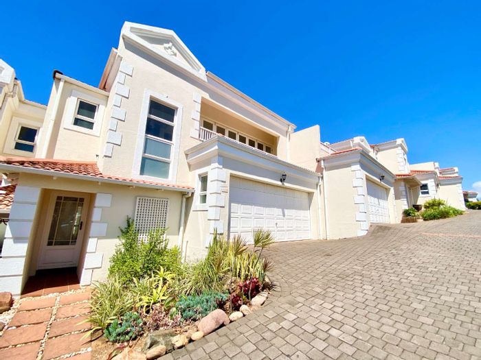 La Lucia Townhouse For Sale: 3 bedrooms, sea views, pool, security, garden.