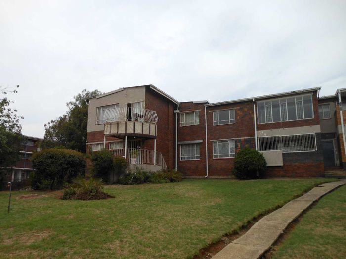 For Sale: Townhouse in Townsview with pool, 3 bedrooms, garage, and utility room.