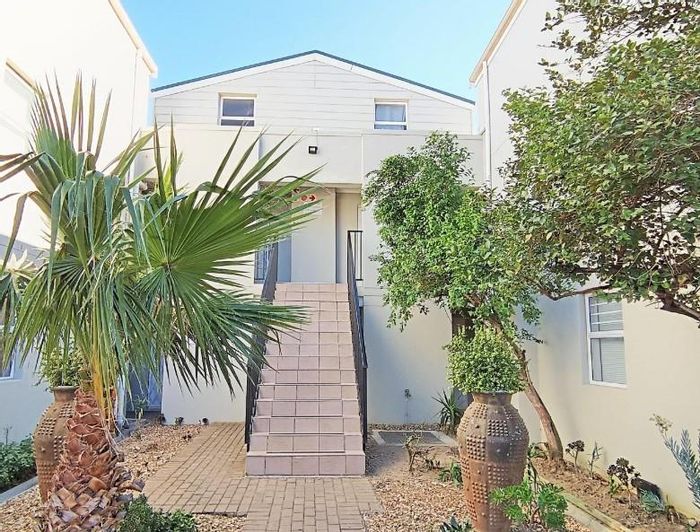 2-Bedroom Apartment For Sale in Gordons Bay Central with Pool and Balcony Access.