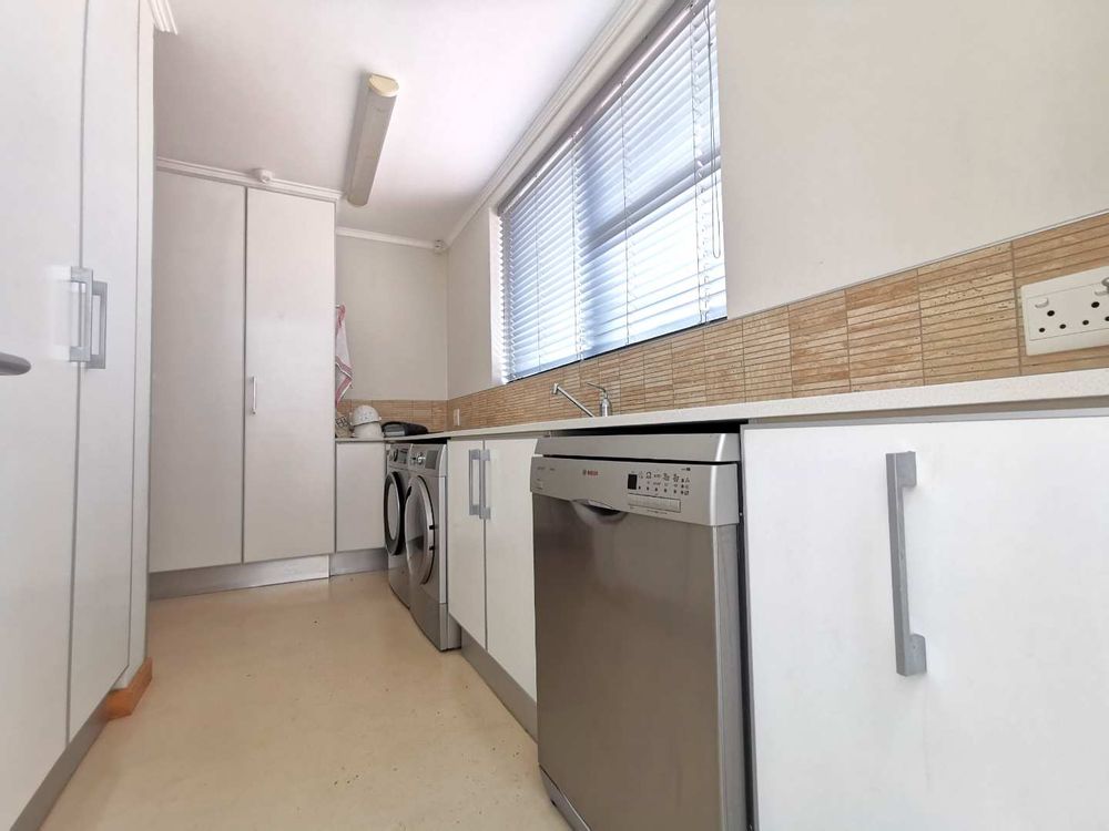 SCULLERY/LAUNDRY  NEXT TO THE OPEN-PLAN KITCHEN 
