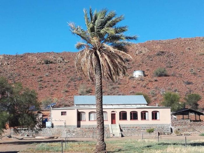 For Sale: Helmeringhausen Central Farm with boreholes, game camps, and tourism potential.