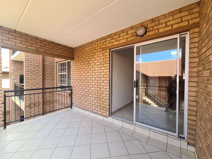 2-Bedroom Apartment in Hazeldean To Rent with Balcony, Garage, and Amenities.