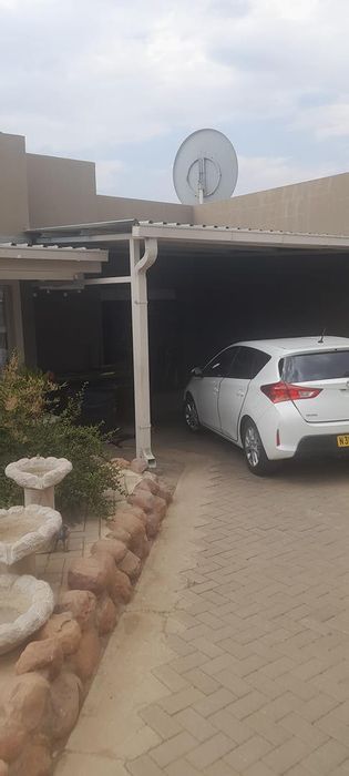 2 Bedroom house in Olympus Village with patio, garage, and open plan living. For Sale.