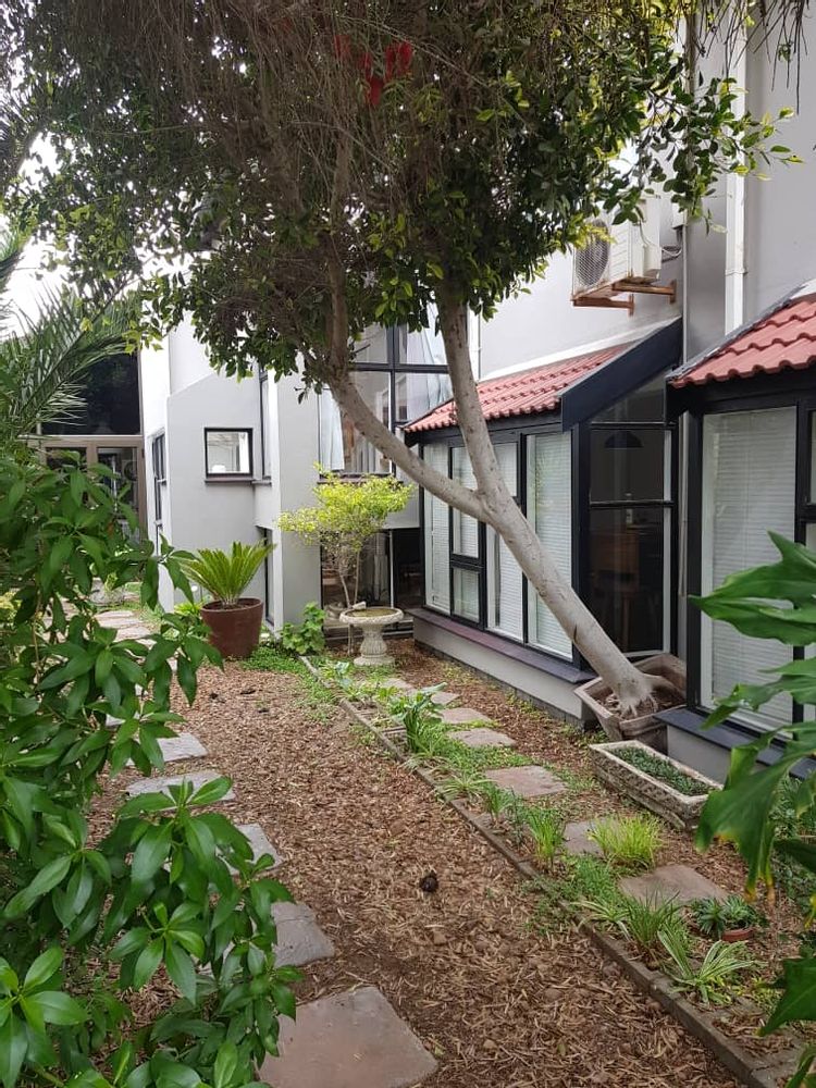 Enclosed yard with a beautiful garden