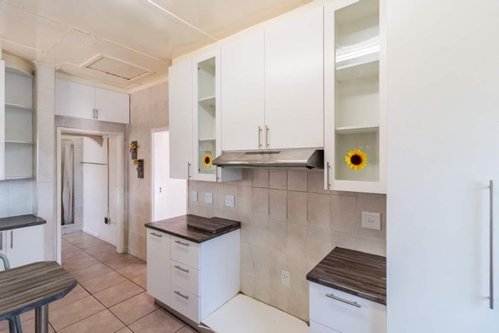 Spacious 4-bedroom house in Sydenham with flatlet, parking, and braai area. For Sale.