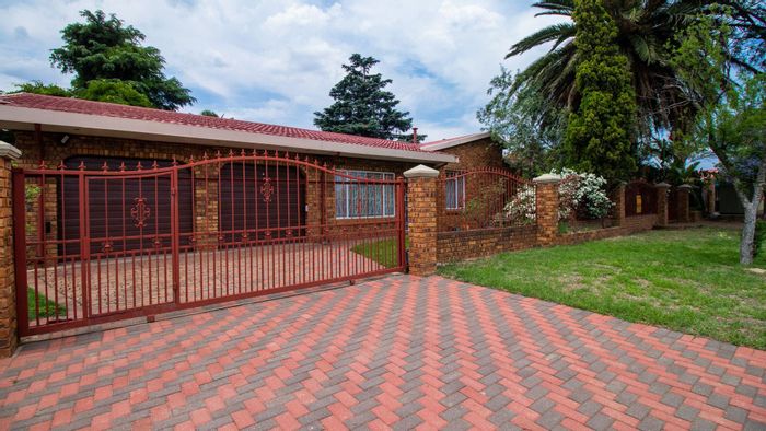 For Sale: House in Mackenzie Park with garden, koi pond, and double garage.