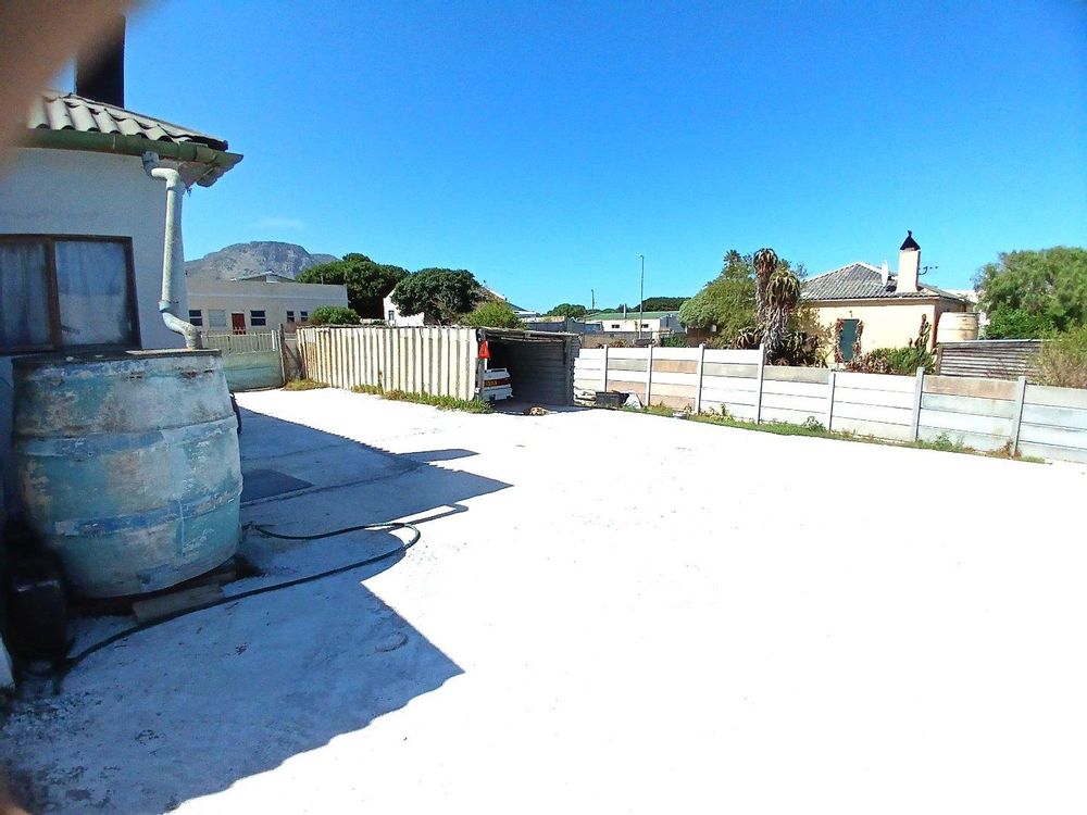 Part of our Backyard. Parking facility (or Garage) at the far back.