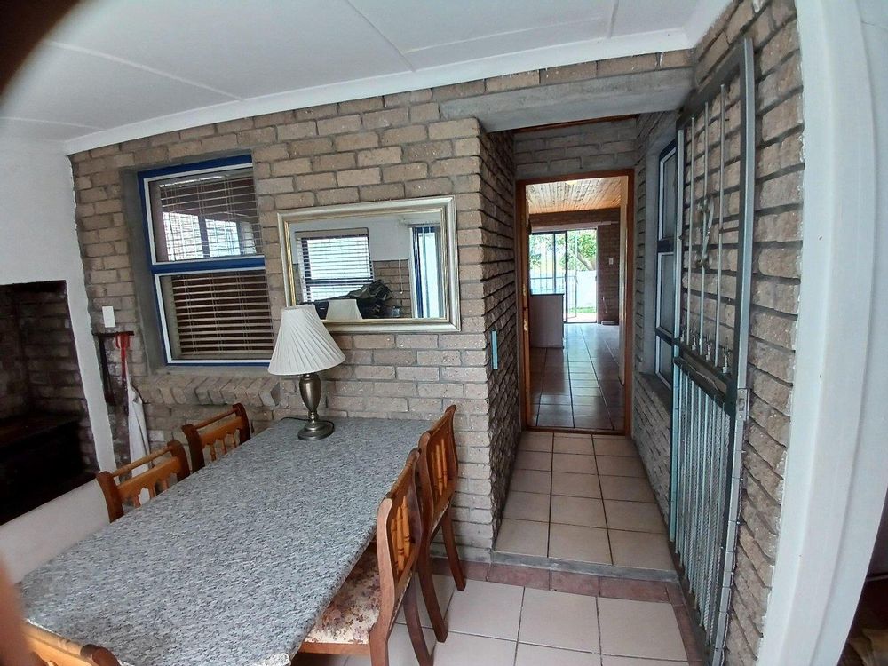 Same BBQ Room - Passage leading to Living Area, Kitchen, 2 Bedr and Bath Room.