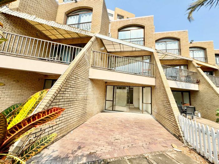 To Rent: Spacious Umhlanga Central townhouse with beach access, pool, and squash court.