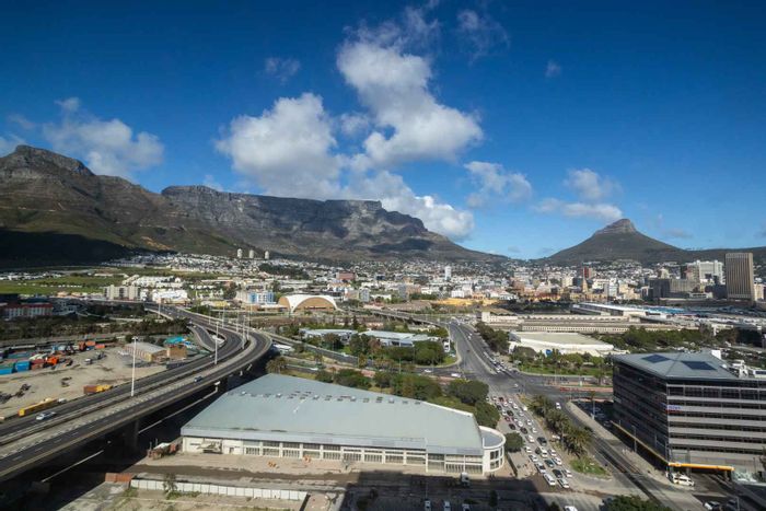 For Sale: Foreshore Apartment with loft, pool, gym, and Table Mountain views.