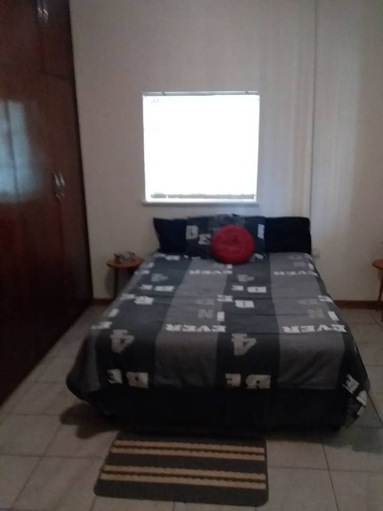 Main house- bedroom 2 with built-in cupboards