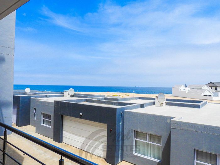 Dolphin Beach Apartment For Sale: Two bedrooms, sea views, indoor barbecue, tandem garage.