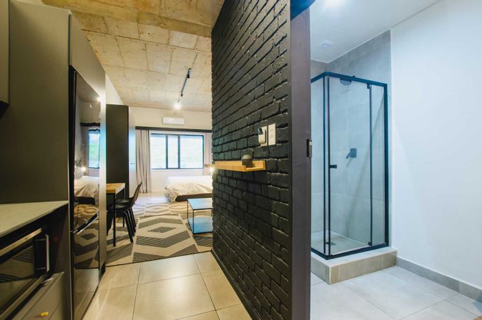 To Rent: Furnished Sandown Apartment with rooftop bar, co-working spaces, and 24/7 security.