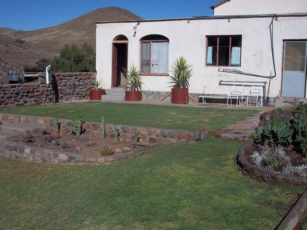 Main house garden area with grass