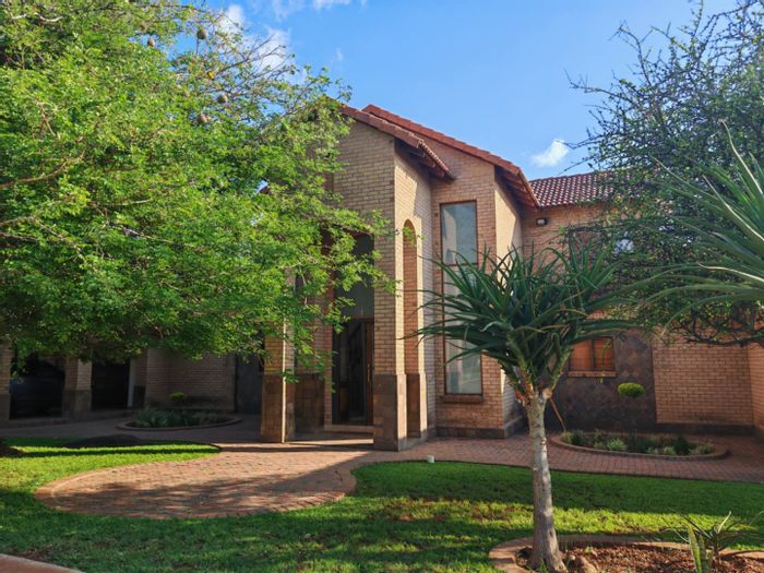 For Sale: Spacious 4-Bedroom House in Burgersfort Central with 4 Garages and Study.