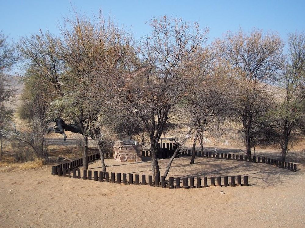 Another campsite with fire place and basin