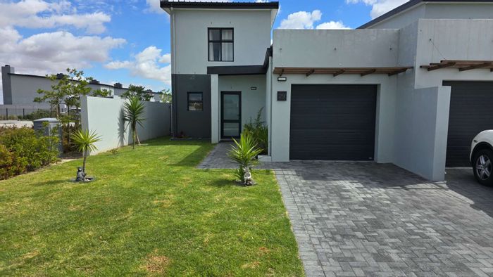 For Sale: House in Kraaifontein Central with 24-hour security, 3 bedrooms, and braai.