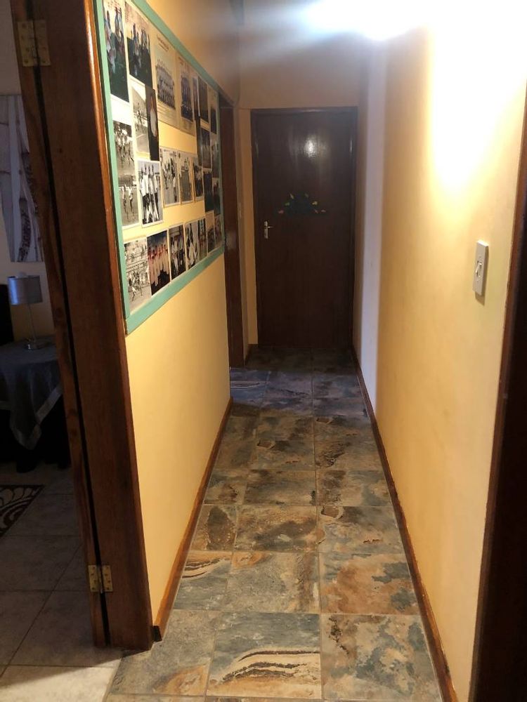 Hallway leading to bedrooms from living room