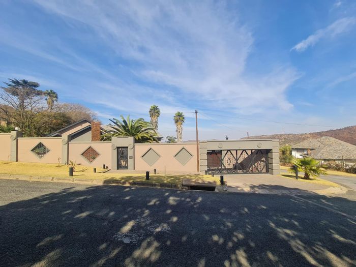 For Sale: Linmeyer House with pool, large garage, and entertainment spaces.