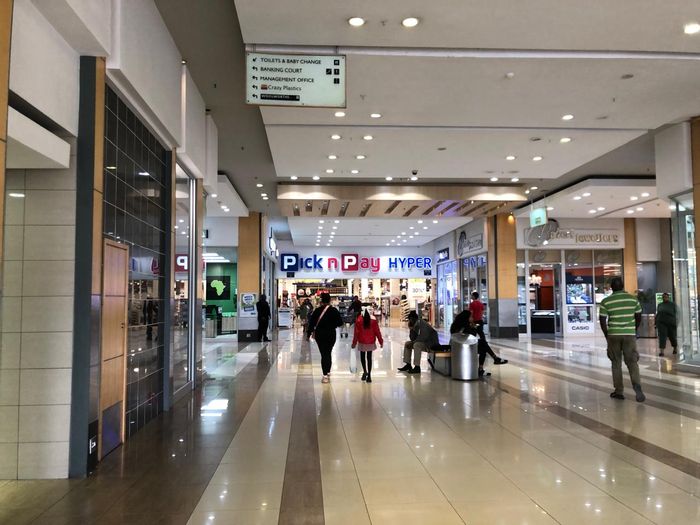 Retail space to rent in The Gardens, high foot traffic, ample parking available.
