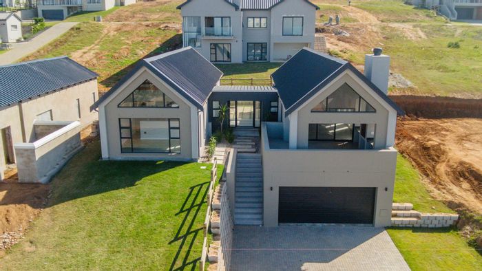 For Sale: House in Hartland Lifestyle Estate with braai room, garage, and trails.
