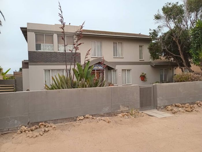 House for Sale in Henties Bay Central: 4 Bedrooms, Garage, Garden, Walk to Ocean.