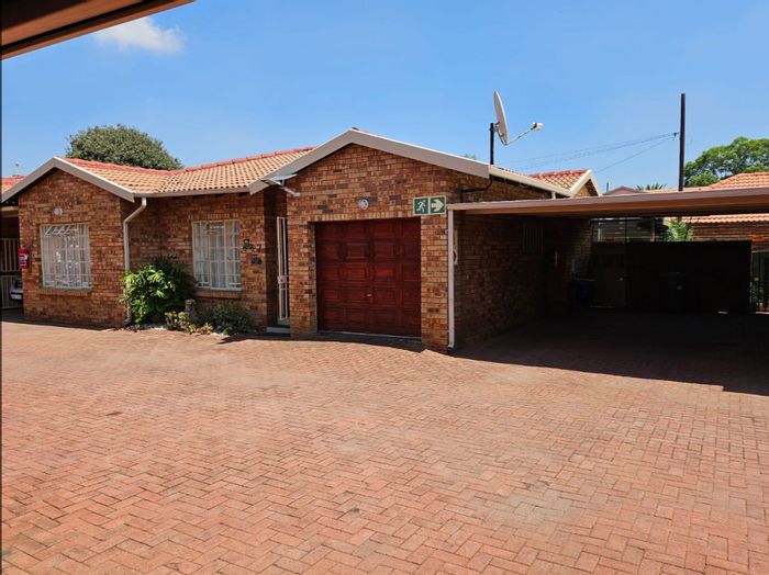 For Sale: Townhouse in New Redruth with 3 beds, garden, garage, and security.