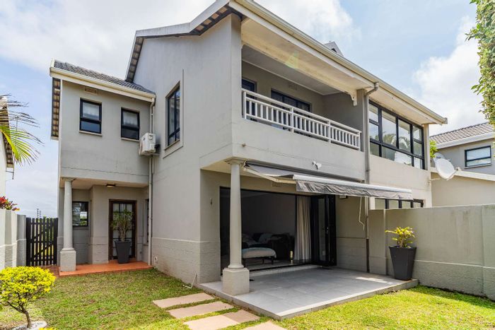 For Sale: Townhouse in Umhlanga Central with pool, garage, and pet-friendly policy.