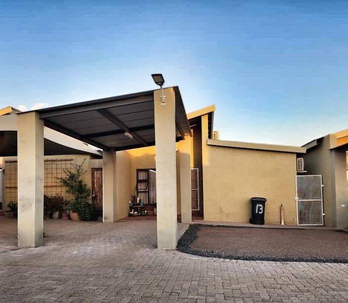 Townhouse for sale in Keetmanshoop Central: 2 beds, BBQ area, secure parking.