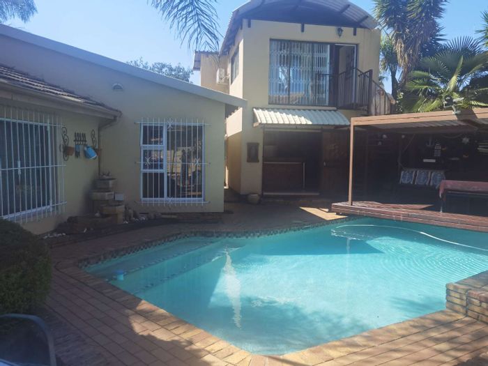 For Sale: House in Van Riebeeck Park with pool, flatlets, and double garage.