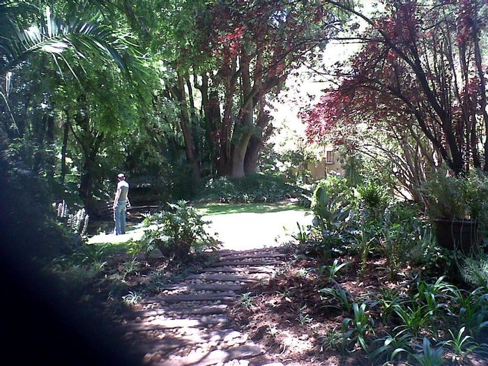 To Rent: 2-Bedroom Townhouse in Sandown with pool, garage, and communal gardens.