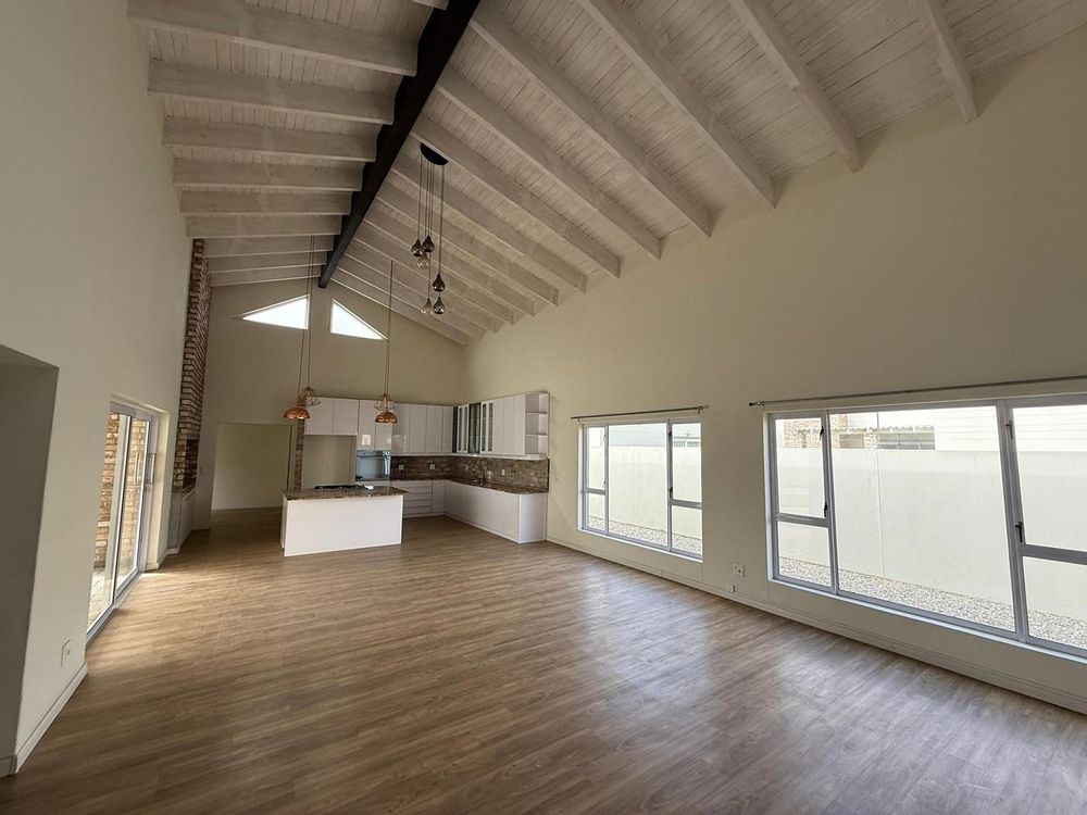Open-plan kitchen, living, and dining area