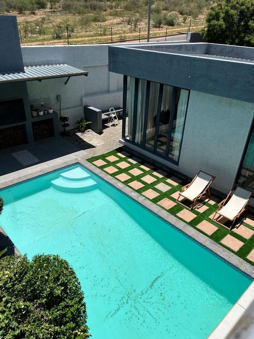For Sale: House in Kleine Kuppe with pool, bar, and mountain views.