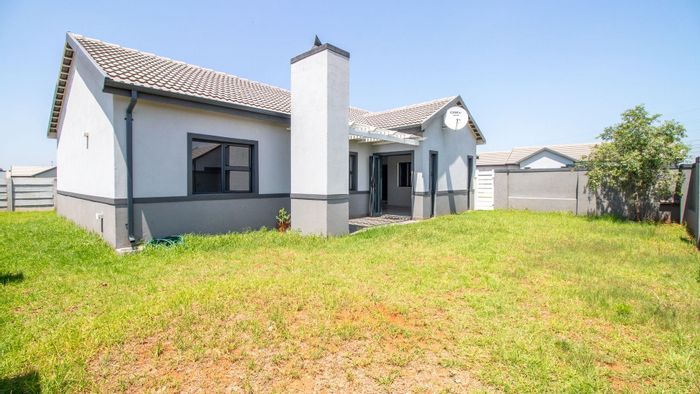 Rynfield House For Sale: Secure cluster home with 3 beds, braai area, and garage.