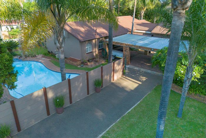 For Sale: House in Van Riebeeck Park with pool, flatlet, and secure enclosure.