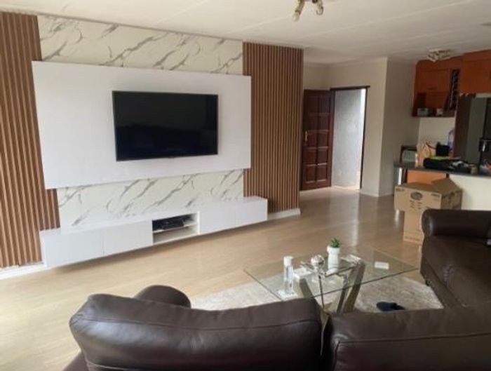 For Sale: Townhouse in Corlett Gardens with garden, carport, and communal pool.