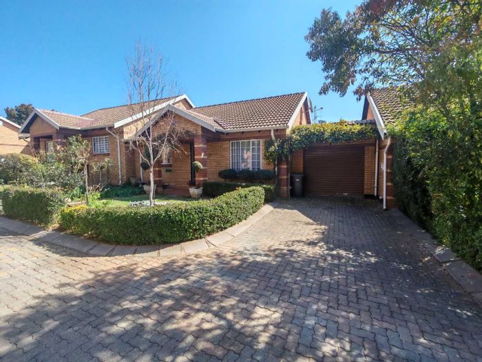 For Sale: 2-Bedroom Townhouse in Clubview with garden, garage, and open parking.