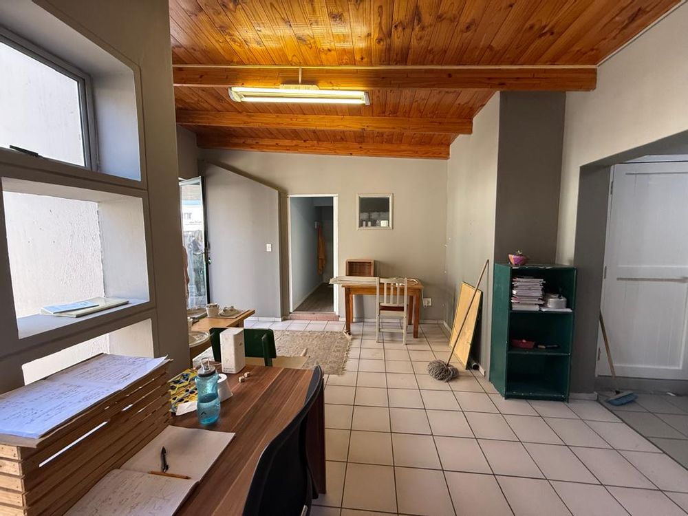 Part of the small office space at the back