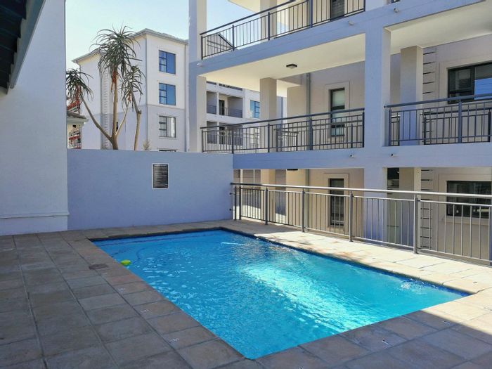 1 Bed Apartment To Rent in Morningside with garden, gym, pool, and security.
