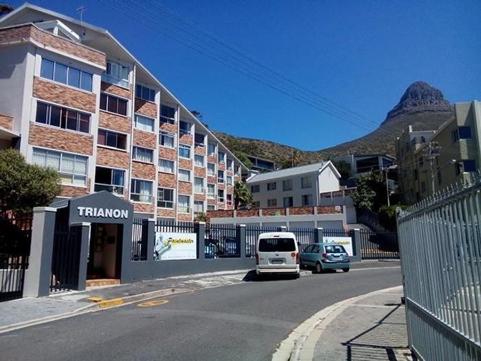 Sea Point Apartment For Sale: Secure garage, prime location near CBD and promenade.