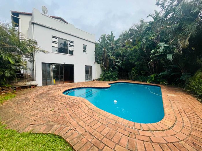 Umgeni Park House For Sale: Spacious living, outdoor entertaining, study, pool, and security.