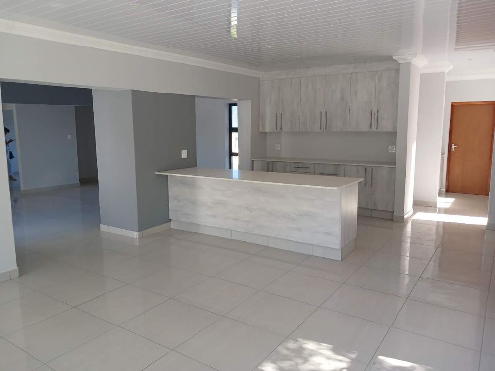 Main Living Area (with Kitchen at the back) - accessing 2nd Living Area on our left.