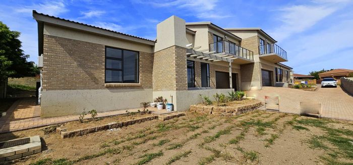 For Sale: House in Dana Bay with 3 bedrooms, double garage, and braai balcony.